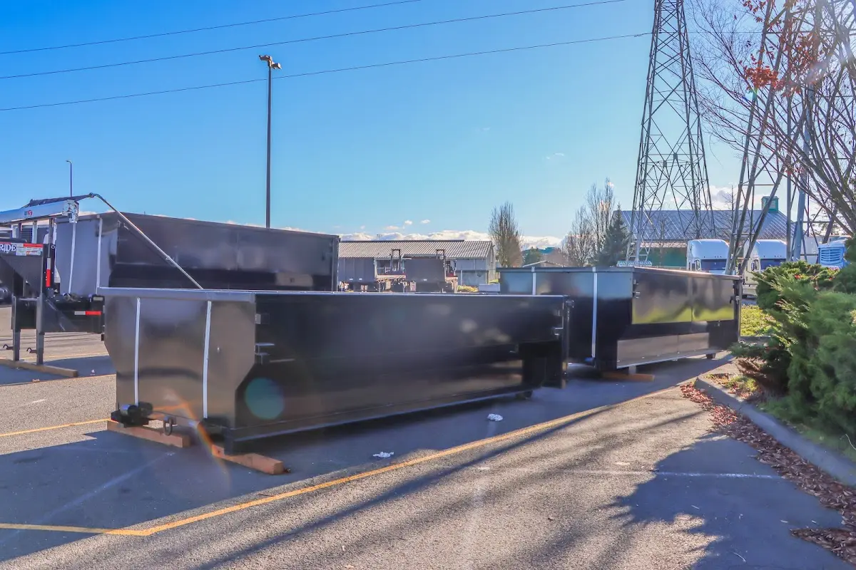 Roll-off dumpster ready for waste disposal at job site for 2 Yard Dumpster Rental in Cherryville